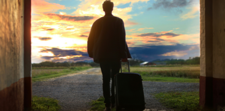 Effects of Minority Language Speakers Migration_guy with suitcase leaving